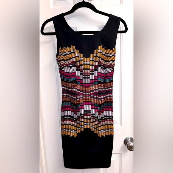 bebe Dresses & Skirts - Bebe fitted dress with cut out in back, Size XXS